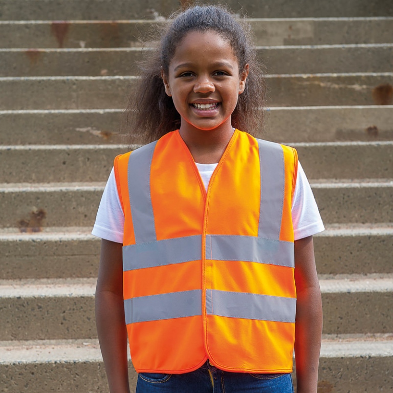 School wear hi vis vest for enhanced visibility safety worn over school uniform